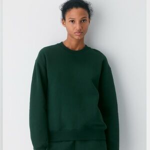 Aritzia Deep Olive Sweatfleece (not same as cover photo)
